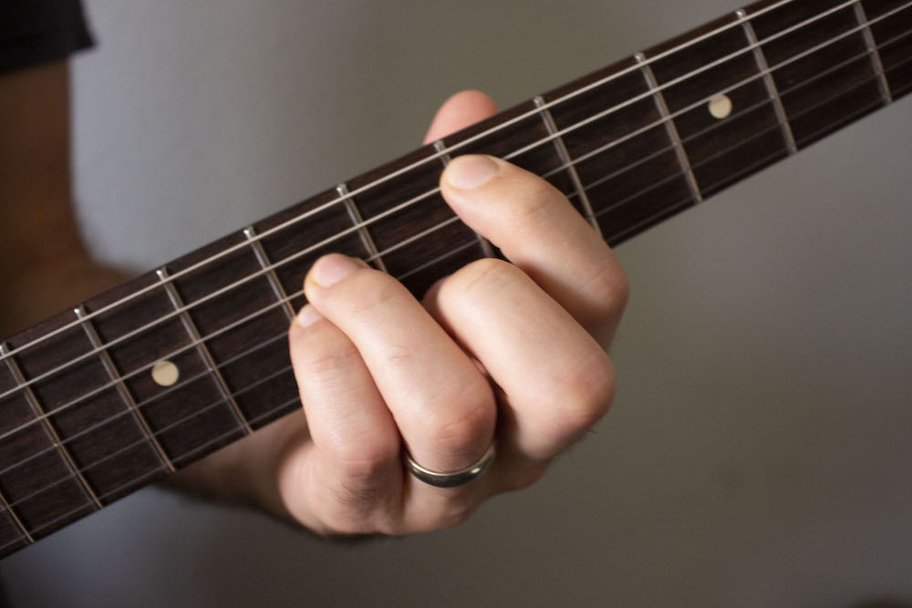 Power chord hand position side view